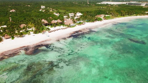 Aerial view of tropical beachfront resort with turquoise Caribbean water Stock Footage 345689660