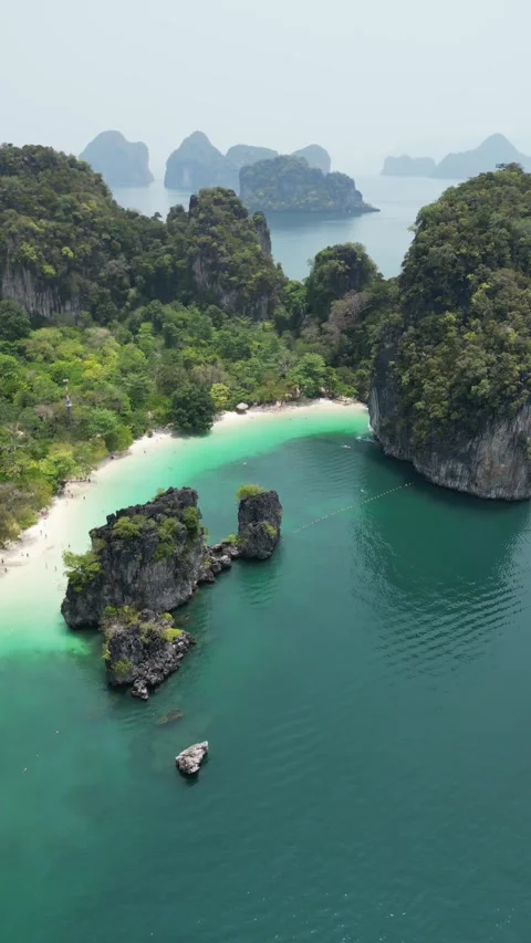 Aerial View of Tropical Krabi Beach and Limestone Cliffs in Krabi, Thailand Stock Footage 335581253