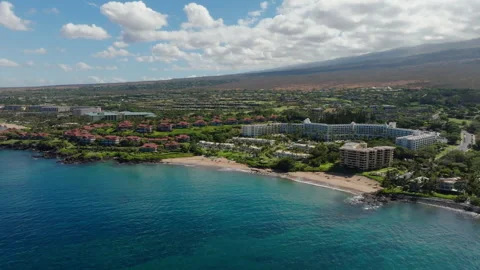 Aerial view of tropical sandy beach in Wailea Maui Hawaii Stock Footage 250414556