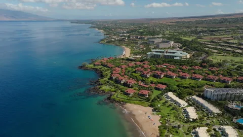 Aerial view of tropical sandy beach in Wailea Maui Hawaii Stock Footage 250415624
