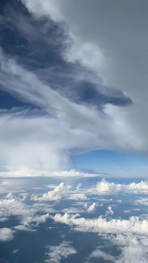 Aerial view of tropical storm clouds and blue sky over Japan on sunny day Stock Footage 292879525
