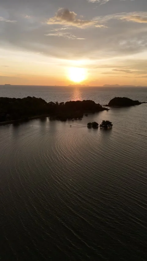 Aerial View of a Tropical Sunset Over the Sea in Koh Lanta, Thailand Stock Footage 335960222
