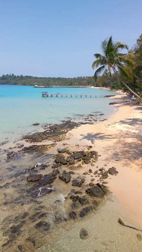Aerial view of a tropical turquoise beach and pier on Koh Kood island, Thailand Stock Footage 323296177
