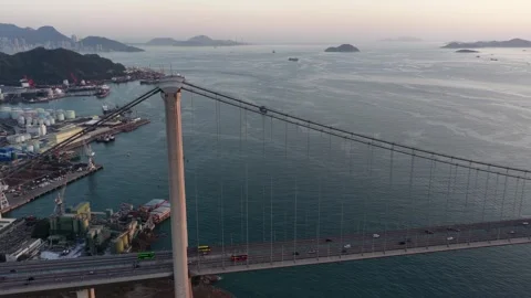 Aerial view of tsing ma bridge traffic in hong kong at sunset Vídeo Stock 331639883