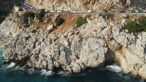 Aerial View of Turkish Beach Surrounded by Mountains Stock Footage 240310593