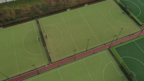 Aerial view that turns around a complex of multiple sport fields Stock Footage 142751441