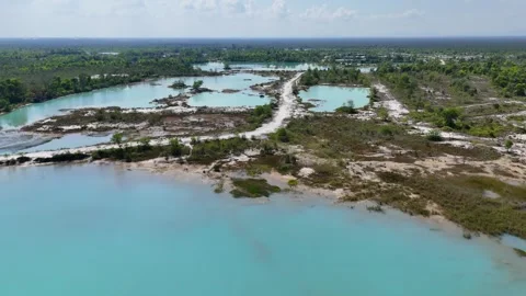 Aerial view of turquoise mining pond in Indonesia. Stock Footage 339117212