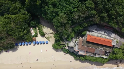 Aerial View of Turquoise Ocean Waves Crashing on Tropical Sandy Beach in Bali Stock Footage 334571683