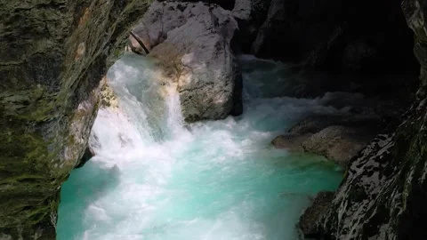Aerial view of turquoise river pool inside narrow gorge, Slovenia Stock Footage 325218327