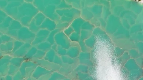Aerial view of turquoise water in a mining pond, Indonesia. Stock Footage 339116546
