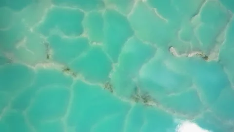 Aerial view of turquoise water patterns in Beruntung Baru, Indonesia. Stock Footage 339116470
