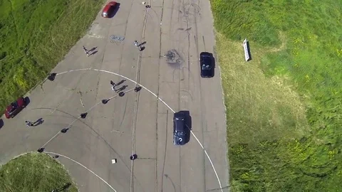 Aerial view of two BMW e30 at the drag race Stock Footage 69108810