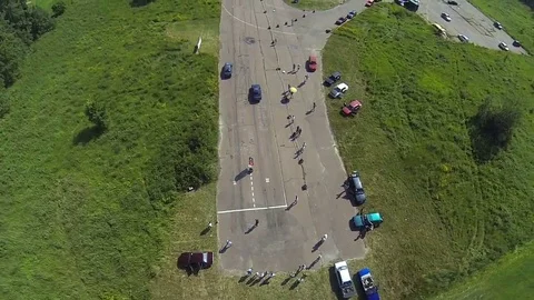 Aerial view of two BMW e30 at the drag race Stock Footage 69110593