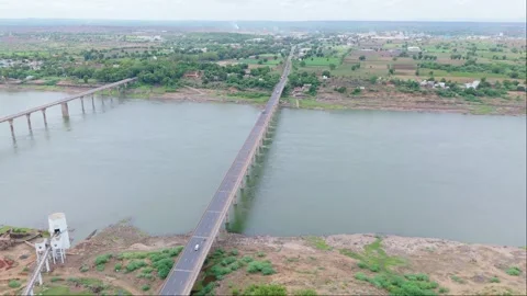 Aerial view of two bridge over a wide river Stock Footage 279869926