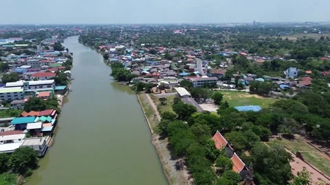 Aerial view of two communities along the Chao Phraya River. Stock Footage 314947640