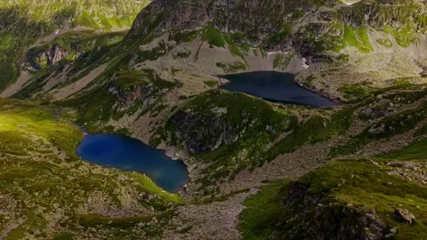 Aerial View of Two Deep Blue Alpine Lakes Stock Footage 345385970