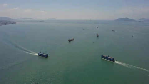 Aerial view two ferry move at different direction at sea near Penang Island Vídeos de archivo 121143497