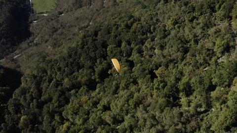 Aerial view of two guys flying in tandem paraglide above Soca Valley Stock Footage 120117475