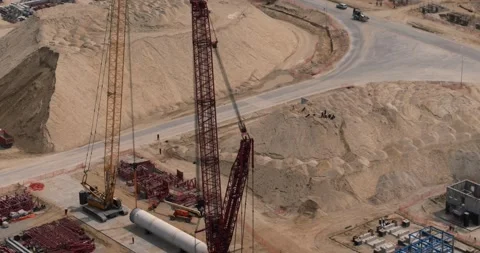 Aerial view of two huge cranes in desert. Stock Footage 138225018