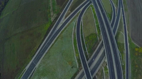 AERIAL view of two intersecting highways. Airplane view of speed motorway, HDR Video stock 58446023