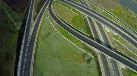 AERIAL view of two intersecting highways. Airplane view of speed motorway, HDR Vídeo Stock 58462034
