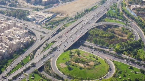 Aerial view of two-level road junction in Tehran, Iran Stock Footage 99575425