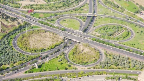 Aerial view of two-level road junction in Tehran, Iran Stock Footage 99576611