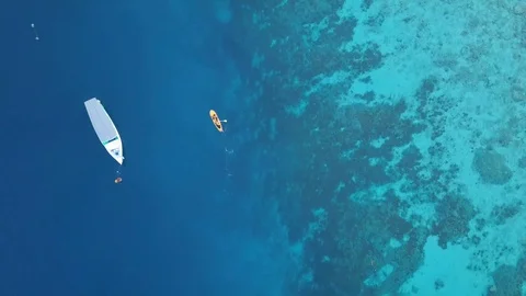 Aerial view of two-man with kayak near Pulau Macan Island, Indonesia Stock Footage 126148447
