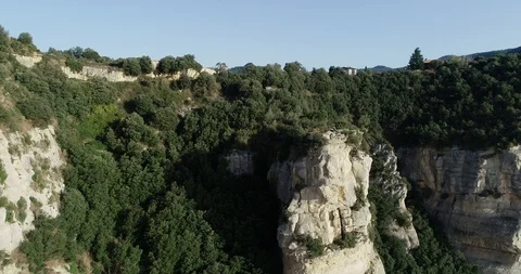 Aerial view of two people on a precipice Stock Footage 101568901
