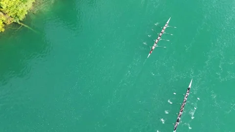 Aerial View of Two Rowing Eights on Turquoise Lake Bled, Slovenia Vídeo Stock 345579884