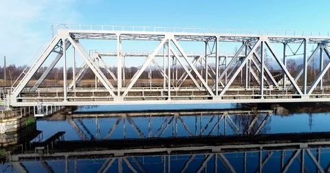 Aerial view of two train bridges in winter landscape in the city near the lake. Stock Footage 84026939