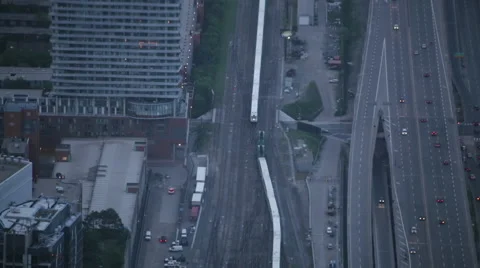 Aerial view of two trains passing in the city Stock Footage 64923393