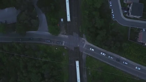 Aerial View of two trains passing at the exact same moment on separate Video stock 138049799