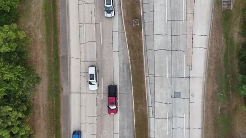 Aerial view of two way street with cars driving in Woodlands, Houston, USA Stock Footage 336813892