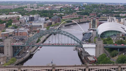 Aerial view of the Tyne Bridge going over the River Tyne Stock Footage 277552896