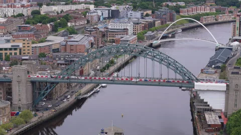 Aerial view of the Tyne Bridge going over the River Tyne Stock Footage 277552924