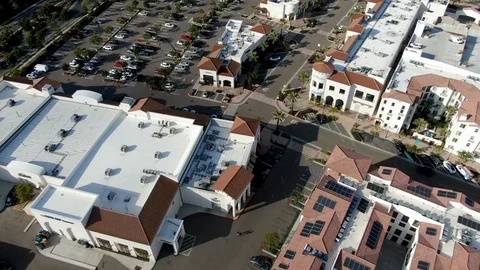 Aerial view of typical small town shopping center with parking . California Stock Footage 127270464
