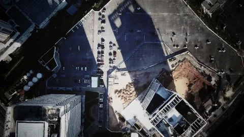Aerial view of typical small town shopping center with parking Stockbeeldmateriaal 129879064