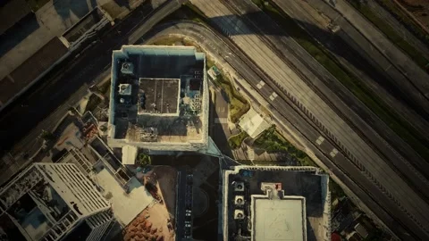 Aerial view of typical small town shopping center with parking Stock Footage 131629596