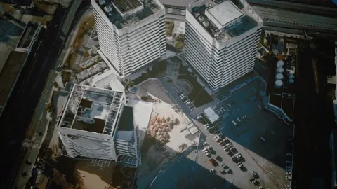 Aerial view of typical small town shopping center with parking Stock Footage 133838144