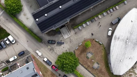 Aerial View of UAV Washing Windows on Modern Building Stockbeeldmateriaal 344734974