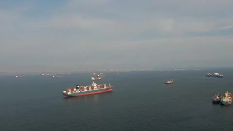 Aerial view of ultra large container ship CMA CGM J.Adams Stock Footage 242483066