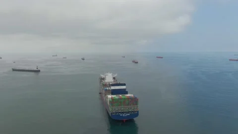 Aerial view of ultra large container ship CMA CGM J.Adams Stock Footage 242483858