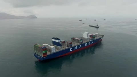 Aerial view of ultra large container ship CMA CGM J.Adams Stock Footage 242483893