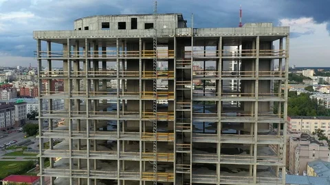 Aerial View of under construction building at construction site in center of the 스톡 동영상 113581455