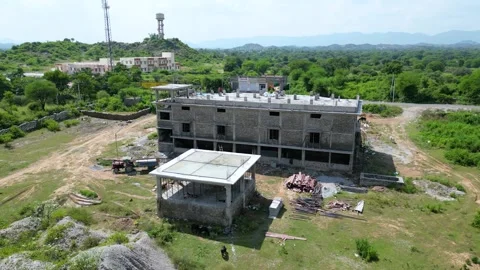 Aerial view of under-construction building site in rural India Stock Footage 310487654