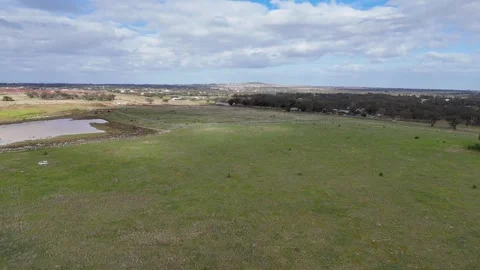 Aerial view of undeveloped grasslands in Strathtulloh, Melbourne, Australia. 스톡 동영상 344909765