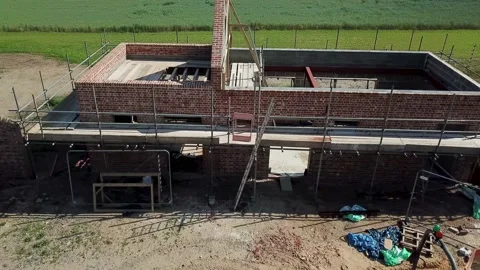 Aerial view of an unfinished barn conversion 動画素材 163150533