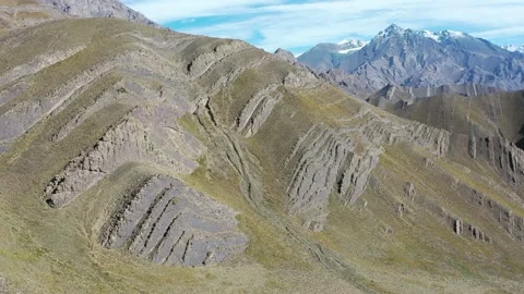 Aerial view of unique folded mountain landscape in Bogda Peak Vídeos de archivo 344887680