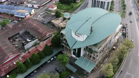 Aerial view of unique leaf shaped building (MPKK HQ) in Perak, Malaysia Stock Footage 133674057